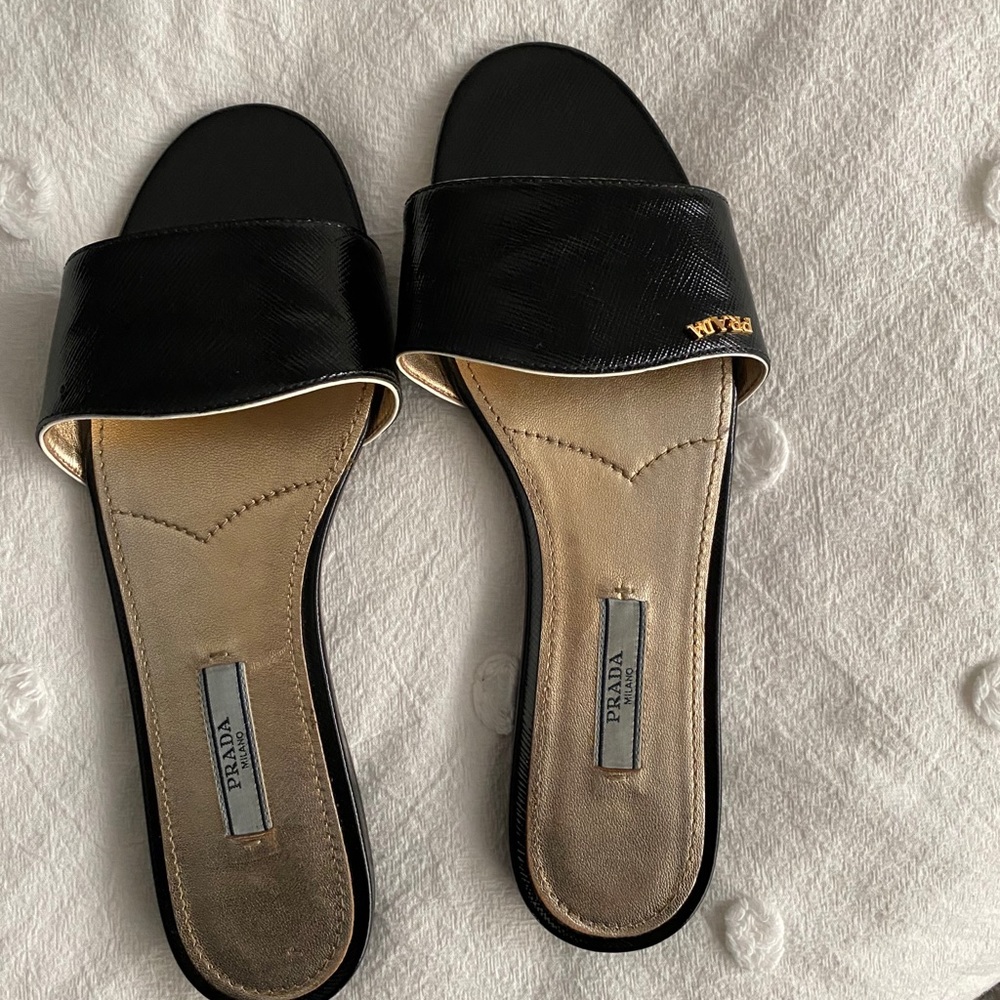 Prada slides —- sold